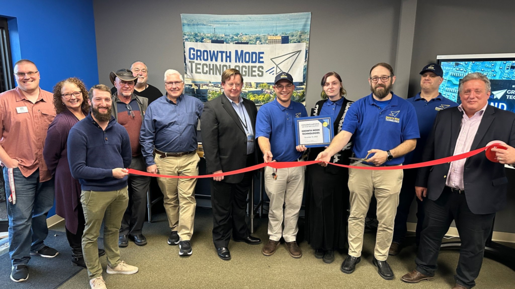 A group of men and women together with Mr. Matt Masur of Growth Mode Technologies